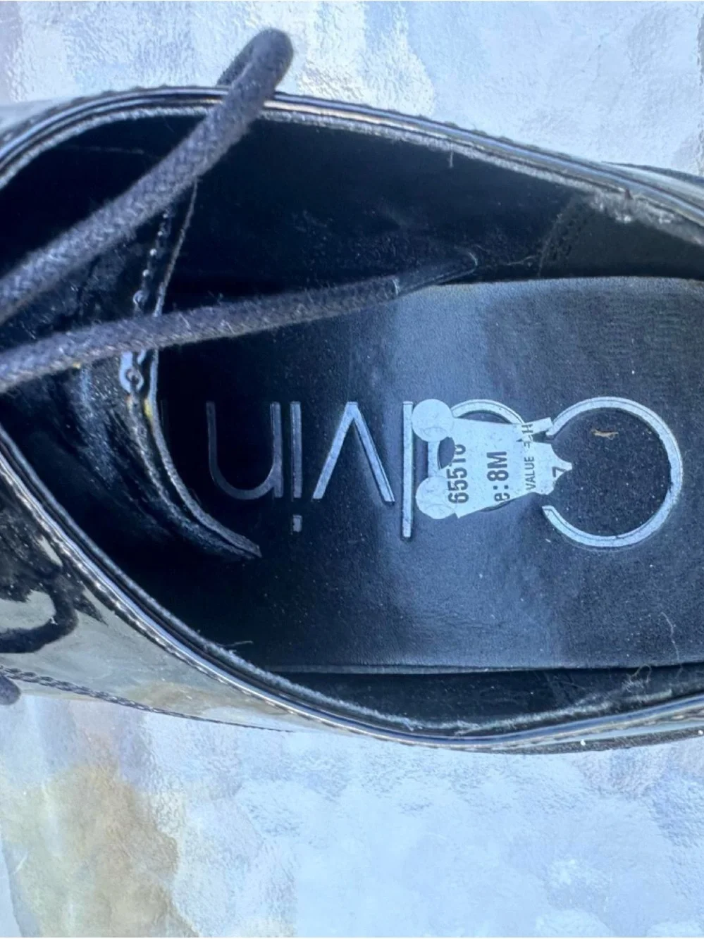 Calvin Klein shiny patent